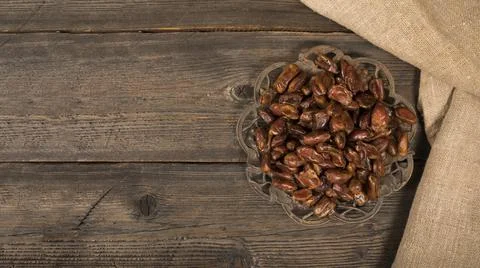 Dates fruit plate wooden table. High quality photo Stock Photos