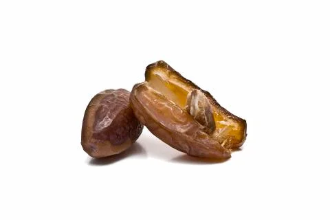 Dates isolated over a white background. Stock Photos