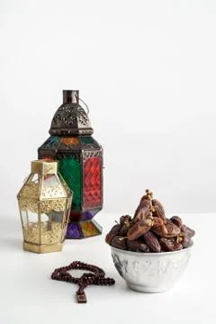 Dates palm and arabic lantern on white Stock Photos