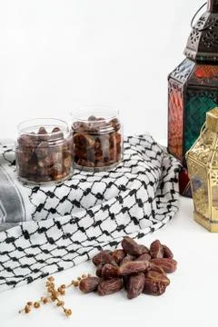 Dates palm and arabic lantern on white Stock Photos