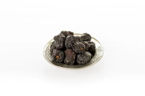 Dates in Plate - organic dates over white background - Arab Food Fotos Stock