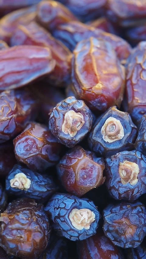 Dates ready for harvest in a market in the Middle East Stock Footage 345384560