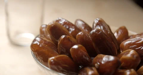Dates rotating, breaking fast during ramadan, studio 4K Stock Footage 264880027