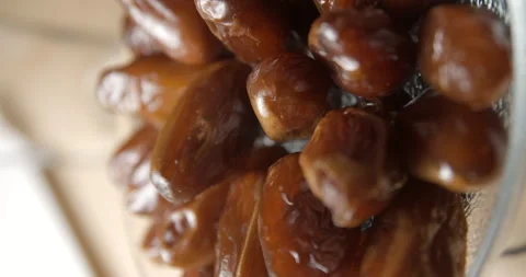Dates rotating, breaking fast during ramadan, vertical studio 4K Stock-Footage 264880130