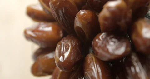 Dates rotating, breaking fast during ramadan, vertical studio 4K Video stock 264881400