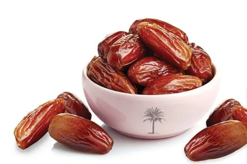 Dates, Sweet dried dates fruit (fruits of date palm Phoenix dactylifera) isol Stock Photos