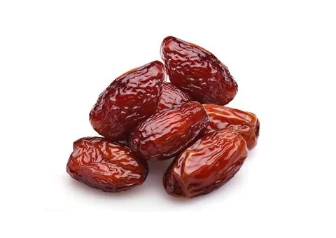 Dates, Sweet dried dates fruit (fruits of date palm Phoenix dactylifera) isol Stock Photos