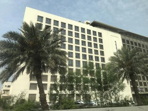 The dates tree front of the building Stock Photos