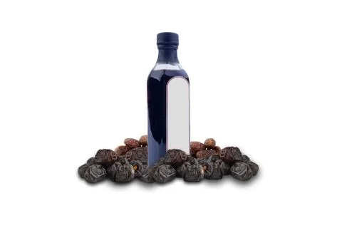 Dates Vinegar bottle and Dates fruit on white background 库存照片