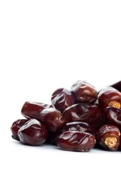 Dates on white background. Dried dates fruit. Stock Photos
