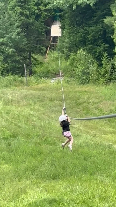 Daughter Gets Stuck Dangling On Zip Line, Nova Scotia, Canada Stock Footage 301120940