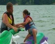 Daughter Getting Off Jet Ski SD Footage