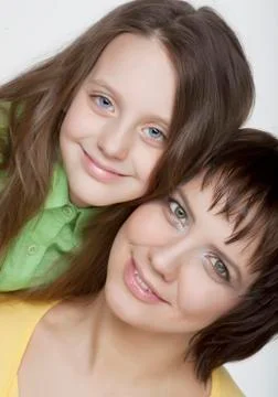 Daughter Hugging Mother Stock Photos