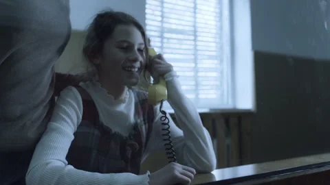 Daughter of a man in jail  talking to him Stock Footage 283091297