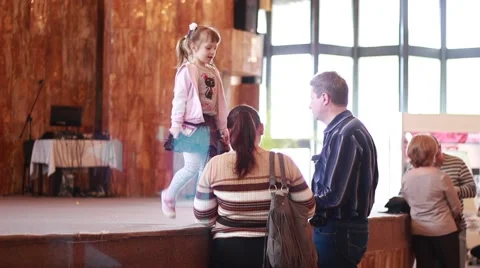 Daughter with parents in a hall Stock Footage 62647653