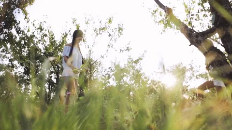 Daughter runs and hugs mother in the forest Stock Footage 80252553