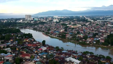 Davao, Philippines - 06/10/2024: Drone captures a cinematic aerial view of Vídeos de archivo 277683973