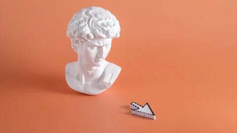 David on a bright orange background and mouse pixel pointer Stock Footage 220614246