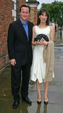 David Cameron With His Wife Samanth Braved The Rain To Host Last Night''s Conser Stock Photos