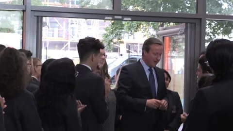 David Cameron pays last visit as PM to free school Stock Footage 148709712