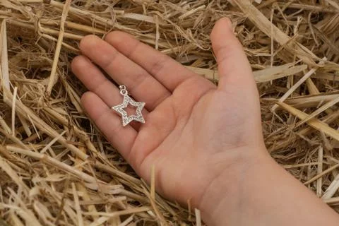 David's star in a hand Stock Photos