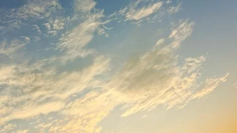 Dawn and dusk clouds arrayed over residential area. Stock Photos