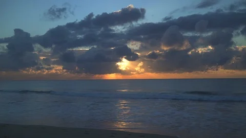 Dawn on beach with clouds Stock Footage 107070765