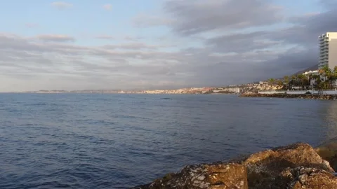 Dawn between clouds over the sea Stock Footage 283865635