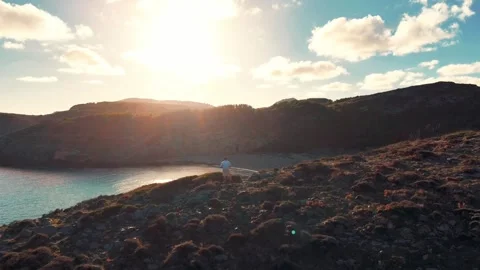Dawn breaks on the eastern coast of Mallorca, Cala Torta Stock Footage 322891660