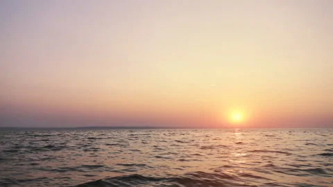 Dawn calm waves calm water Stockbeeldmateriaal 102740848