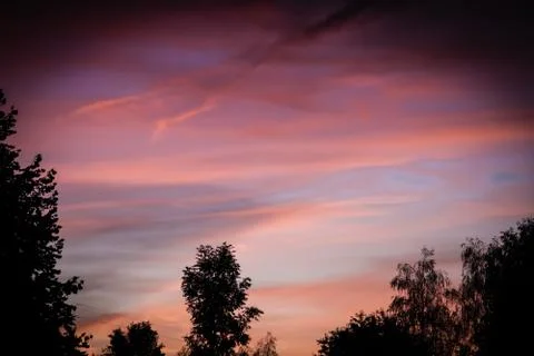 Dawn. Cloud in the sky at the back of the sun. Stock Photos