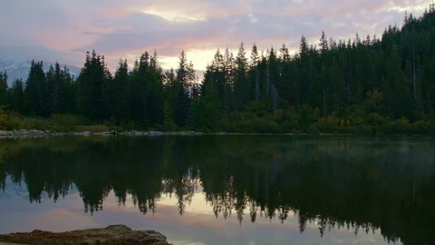 Dawn clouds and reflection of forest Mirror Lake Mt. Hood Oregon Cascades 19 Stock Footage 81613673