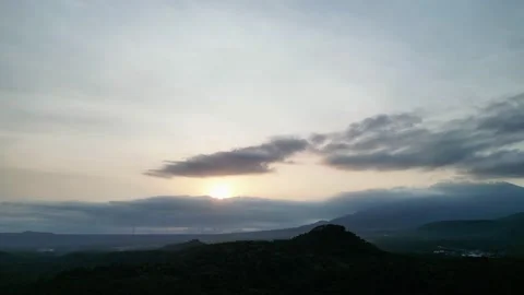 Dawn with clouds in the sky among the mountains 스톡 동영상 238768299