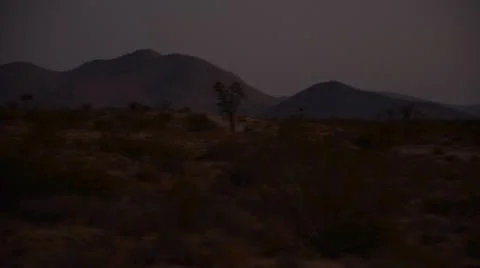 Dawn in the desert pan right Stock Footage 9551249