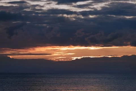 Dawn with dramatic clouds over the Aegean Sea Fotos Stock