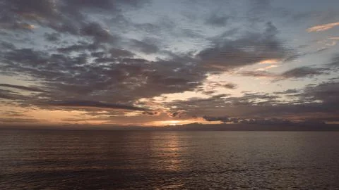 Dawn with dramatic clouds over the Aegean Sea Stock Photos