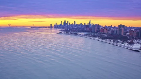 Dawn drone footage featuring downtown Chicago and Lake Michigan shoreline. Stock Footage 331235770