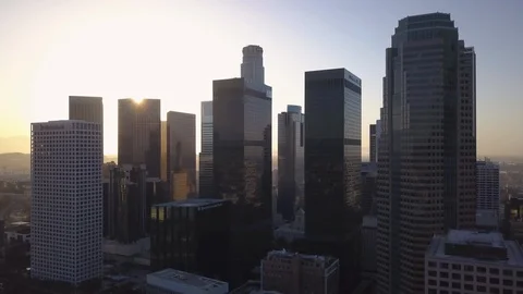 Dawn flying towards downtown LA skyline Stock Footage