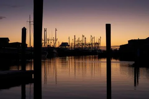 Dawn at the harbor Stock Photos