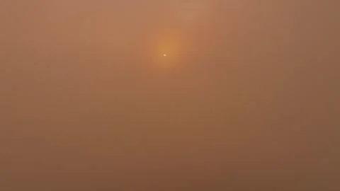 Dawn light shines through low clouds over Phang Nga coast, Thailand Stock Footage 310165514