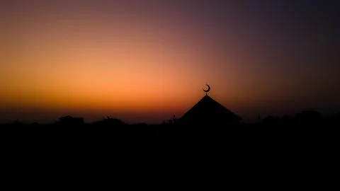 Dawn with Mosque Silhoutte Stock Photos