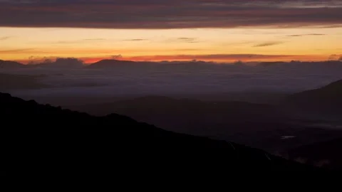 Dawn mountain landscape with cloud inversion background waiting for sunrise 動画素材 168744178