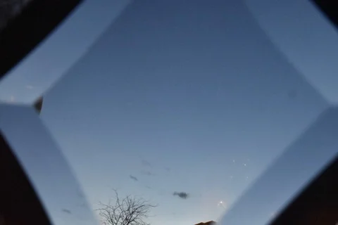 Dawn or dusk, through a leaded glass window - timelapse Video stock 123002733