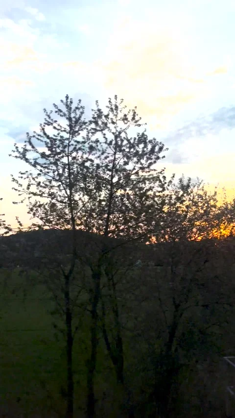 Dawn over the Alps from a train window. Sunset on a motorway near Munich  Stock Footage 274365984