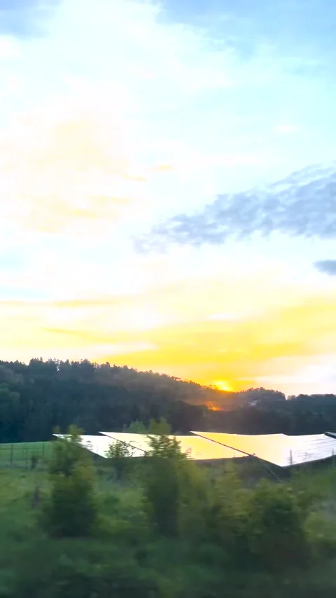 Dawn over the Alps from a train window. Sunset on a motorway near Munich  Stock Footage 274366013