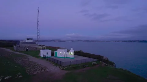 Dawn over BERRY HEAD LIGHTHOUSE, Berry Head, Brixham, Devon, England Stock Footage 166348364