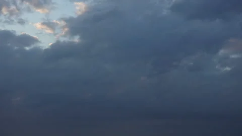 Dawn over the cloud-covered sky time lapse Stock Footage 95042070
