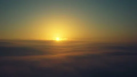 Dawn over the clouds. View from a passenger plane. Stock Footage 165528027