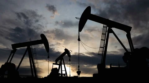 Dawn over petroleum pump, Time Lapse at Sunrise with Fast Clouds Stock Footage 150434047