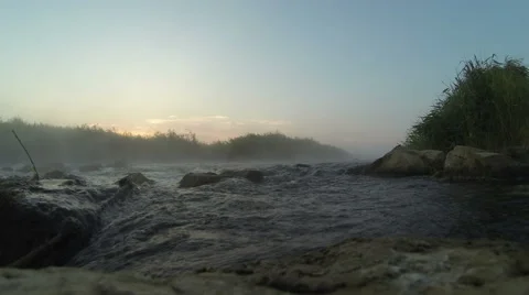 Dawn over Rushing river timelapse 4k 스톡 동영상 53398302